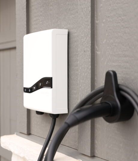 Emporia Pro Level 2 EV Charger installed on house exterior wall